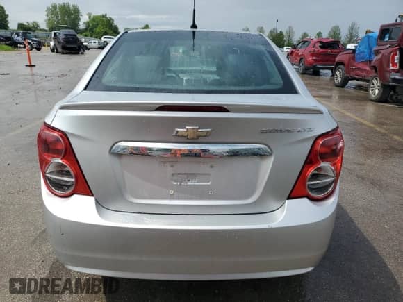 2013 Chevrolet Sonic LTZ с VIN 1G1JE5SG5D4217581, выставлен на аукционе Copart как лот 55977985 с пробегом 49 601 миль миль и Списание • Salvage title. История ставок и продаж доступна на DreamBid. Изображение 6.