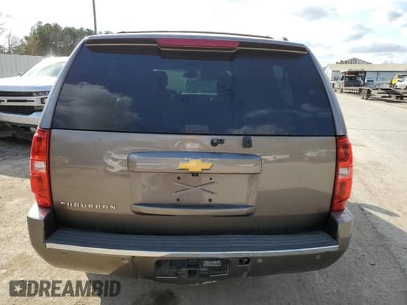 2014 Chevrolet Suburban LTZ with VIN 1GNSCKE03ER151784, listed as a Copart auction lot 43482165 with 247,413 mi miles and Salvage title. Bid and sale history available at DreamBid. Image 6.