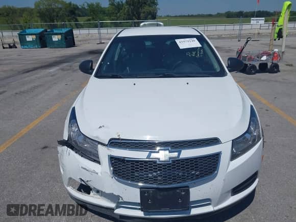 2014 Chevrolet Cruze LS with VIN 1G1PA5SH5E7181440, listed as a IAAI auction lot 42979140 with 94,939 mi miles and . Bid and sale history available at DreamBid. Image 12.