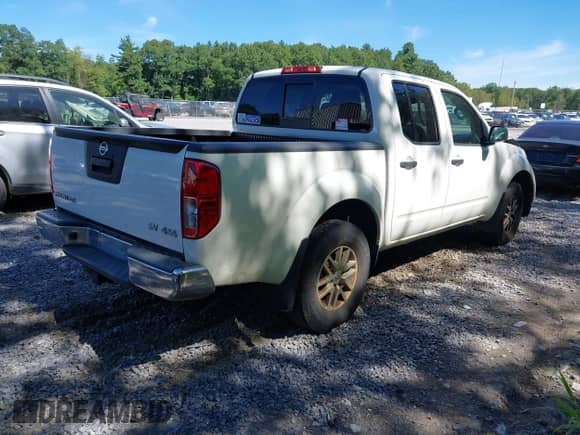 2019 Nissan Frontier SV with VIN 1N6AD0EV2KN873538, listed as a IAAI auction lot 43003970 with 90,588 mi miles and . Bid and sale history available at DreamBid. Image 4.