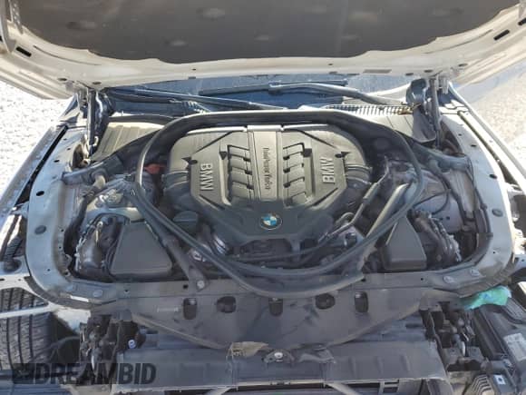 2013 BMW 7 Series 750i with VIN WBAYA8C54DC996698, listed as a Copart auction lot 53235915 with 116,247 mi miles and Salvage title. Bid and sale history available at DreamBid. Image 11.