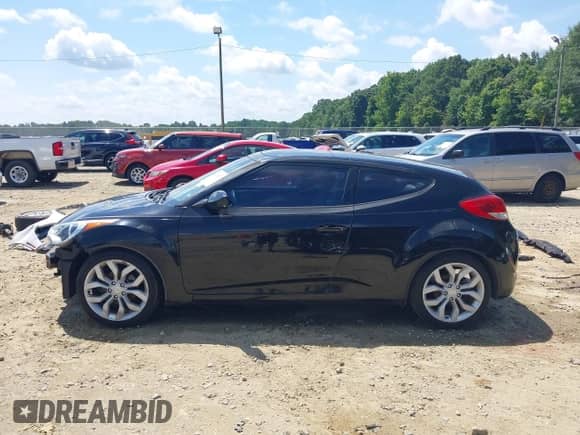 2012 Hyundai Veloster w/Black Int с VIN KMHTC6AD0CU056828, выставлен на аукционе IAAI как лот 42611623 с пробегом 136 242 миль миль и . История ставок и продаж доступна на DreamBid. Изображение 15.