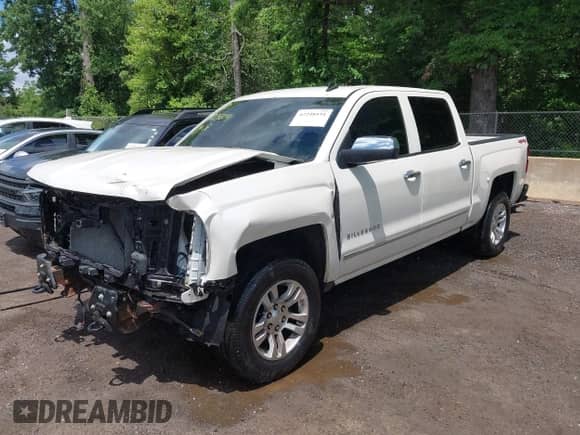 2014 Chevrolet Silverado 1500 LTZ with VIN 3GCUKSEC3EG312519, listed as a IAAI auction lot 42248191 with 141,707 mi miles and . Bid and sale history available at DreamBid. Image 2.