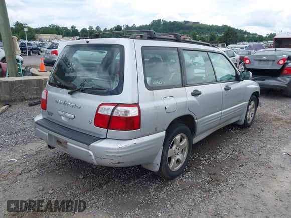 2002 Subaru Forester S with VIN JF1SF65602H736843, listed as a IAAI auction lot 42407569 with 258,241 mi miles and . Bid and sale history available at DreamBid. Image 4.