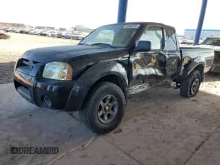 2002 Nissan Frontier XE with VIN 1N6ED26T12C389432, listed as a Copart auction lot 86556214 with 245,397 mi miles and Salvage title. Bid and sale history available at DreamBid. Image 1.