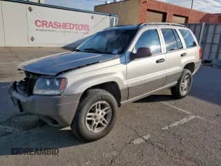 2004 Jeep Grand Cherokee Laredo with VIN 1J4GX48S94C313442, listed as a Copart auction lot 86679925 with 52,727 mi miles and Salvage title. Bid and sale history available at DreamBid. Image 1.