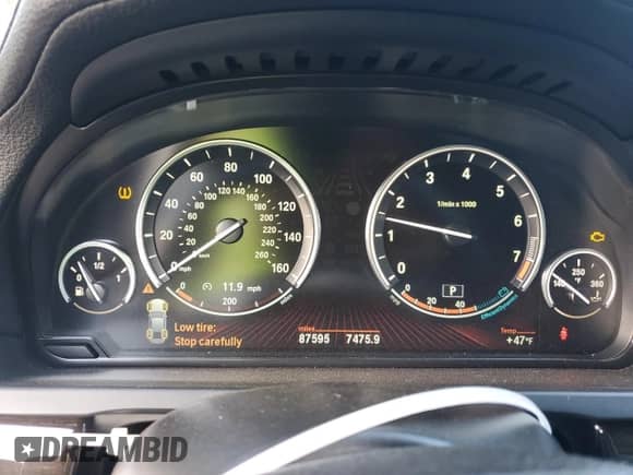 2011 BMW 7 Series 750Li xDrive with VIN WBAKC8C55BC434418, listed as a Copart auction lot 77957584 with 87,595 mi miles and Salvage title. Bid and sale history available at DreamBid. Image 9.