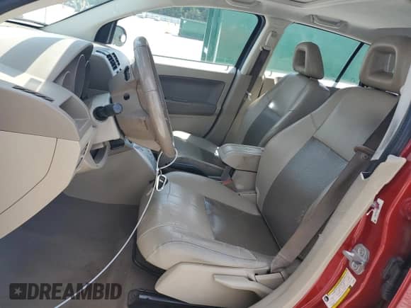 2007 Dodge Caliber R/T z VIN 1B3HB78K57D155353, wystawiony jako Copart lot #56972375 z przebiegiem 151 916 mil mil oraz Szkoda całkowita • Salvage title. Historia ofert i sprzedaży dostępna na DreamBid. Obrazek 7.
