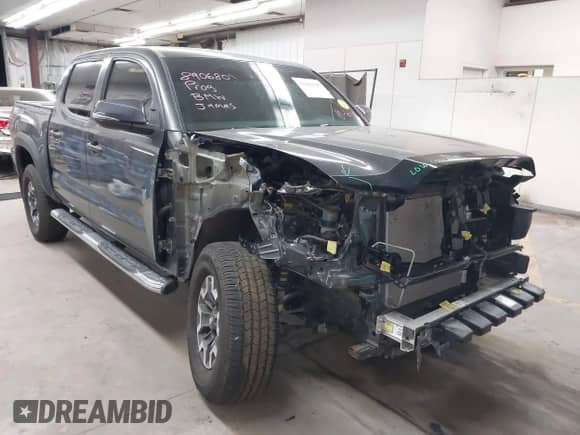 2019 Toyota Tacoma TRD Off Road with VIN 3TMCZ5AN2KM194198, listed as a IAAI auction lot 43463635 with 48,375 mi miles and . Bid and sale history available at DreamBid. Image 1.