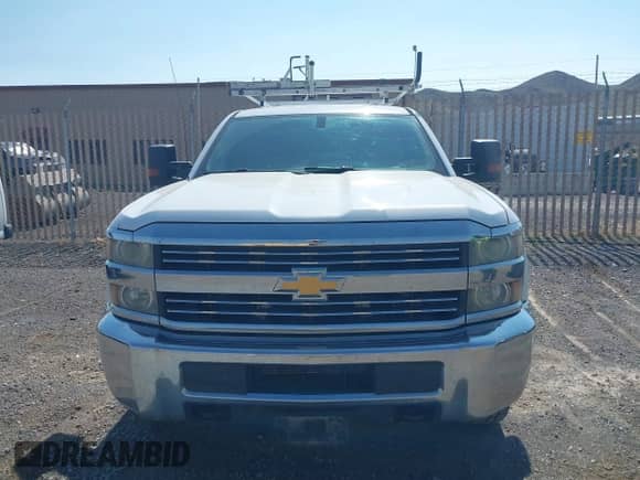 2015 Chevrolet Silverado 2500HD Work Truck with VIN 1GC0KUEG3FZ531558, listed as a IAAI auction lot 43226136 with 241,382 mi miles and . Bid and sale history available at DreamBid. Image 6.