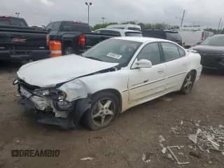 2000 Pontiac Grand Am GT z VIN 1G2NW52E2YM785155, wystawiony jako Copart lot #54650275 z przebiegiem 210 046 mil mil oraz Szkoda całkowita • Salvage title. Historia ofert i sprzedaży dostępna na DreamBid. Obrazek 1.
