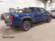 2024 Toyota Tacoma SR5 with VIN 3TMLB5JN3RM054207, listed as a IAAI auction lot 41171946 with 3,808 mi miles and . Bid and sale history available at DreamBid. Image 4.