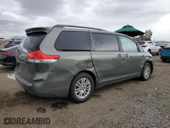 2011 Toyota Sienna XLE AAS z VIN 5TDYK3DC1BS080251, wystawiony jako Copart lot #86554415 z przebiegiem 264 143 mil mil oraz Szkoda całkowita • Salvage title. Historia ofert i sprzedaży dostępna na DreamBid. Obrazek 3.