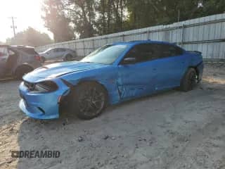 2023 Dodge Charger Scat Pack with VIN 2C3CDXGJ4PH557710, listed as a Copart auction lot 81015515 with 48,619 mi miles and Salvage title. Bid and sale history available at DreamBid. Image 1.