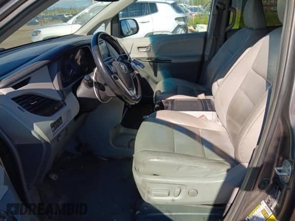 2015 Toyota Sienna Limited with VIN 5TDDK3DC5FS094285, listed as a Copart auction lot 69846845 with 104,048 mi miles and Salvage title. Bid and sale history available at DreamBid. Image 7.
