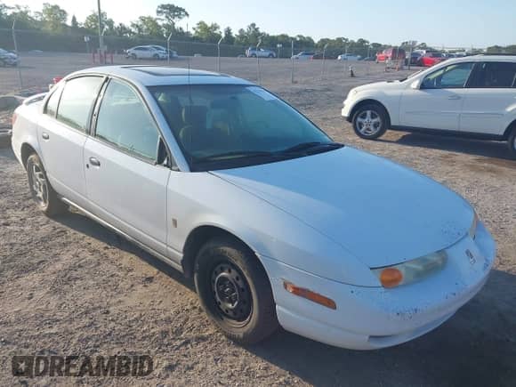 2002 Saturn SL with VIN 1G8ZF52872Z258630, listed as a IAAI auction lot 42136196 with 205,914 mi miles and . Bid and sale history available at DreamBid. Image 1.