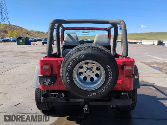 1992 Jeep Wrangler with VIN 2J4FY29S9NJ508783, listed as a Copart auction lot 55336105 with 137,423 mi miles and Salvage title. Bid and sale history available at DreamBid. Image 6.