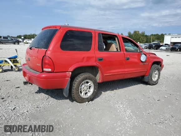 1998 Dodge Durango with VIN 1B4HS28ZXWF160899, listed as a Copart auction lot 75670204 with 181,705 mi miles and Salvage title. Bid and sale history available at DreamBid. Image 3.