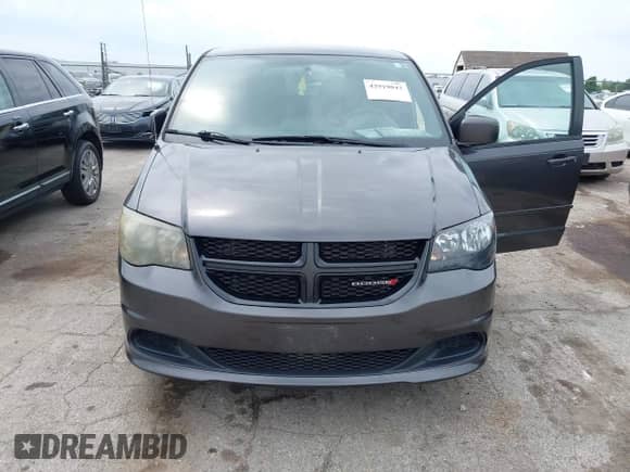 2014 Dodge Grand Caravan SE with VIN 2C4RDGBG7ER361821, listed as a IAAI auction lot 42919043 with 211,735 mi miles and . Bid and sale history available at DreamBid. Image 6.