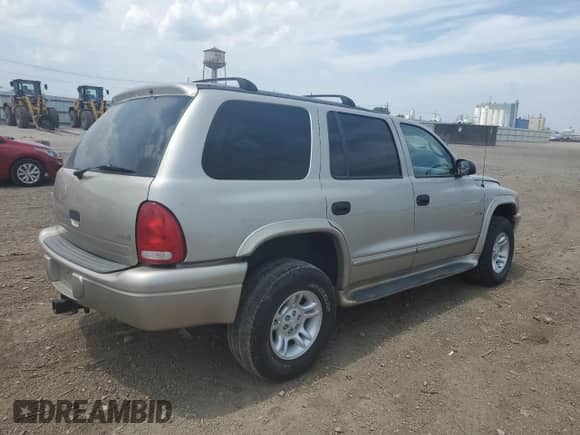 2001 Dodge Durango with VIN 1B4HS28N21F620093, listed as a Copart auction lot 64295925 with 144,498 mi miles and Salvage title. Bid and sale history available at DreamBid. Image 3.