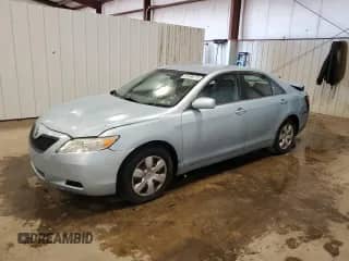 2007 Toyota Camry XLE with VIN 4T1BK46K77U535733, listed as a Copart auction lot 87184715 with 219,188 mi miles and Salvage title. Bid and sale history available at DreamBid. Image 1.