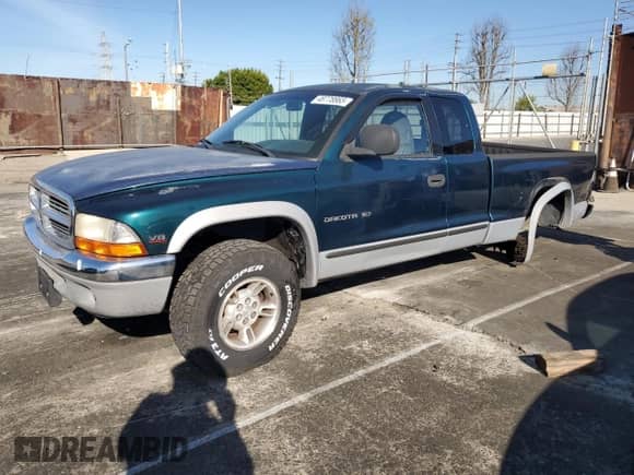 1997 Dodge Dakota with VIN 1B7GG23Y8VS303577, listed as a Copart auction lot 48778865 with 189,316 mi miles and Salvage title. Bid and sale history available at DreamBid. Image 1.