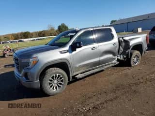 2020 GMC Sierra 1500 AT4 with VIN 3GTP9EED2LG387535, listed as a Copart auction lot 87217755 with 81,581 mi miles and Salvage title. Bid and sale history available at DreamBid. Image 1.