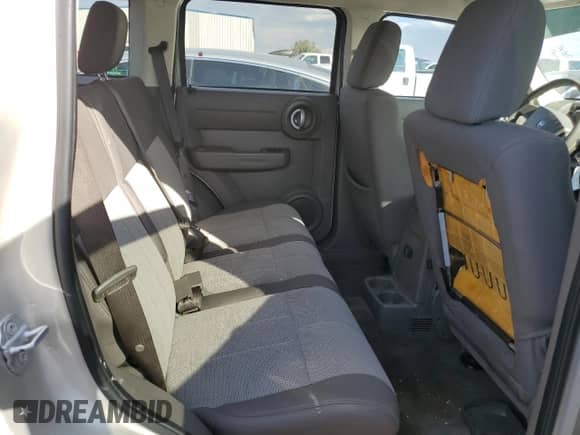 2009 Dodge Nitro SE z VIN 1D8GT28K29W504908, wystawiony jako Copart lot #75272154 z przebiegiem 156 571 mil mil oraz Szkoda całkowita • Salvage title. Historia ofert i sprzedaży dostępna na DreamBid. Obrazek 11.