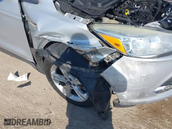 2014 Ford Escape SE with VIN 1FMCU0GX7EUA37725, listed as a IAAI auction lot 43318692 with 157,118 mi miles and . Bid and sale history available at DreamBid. Image 6.