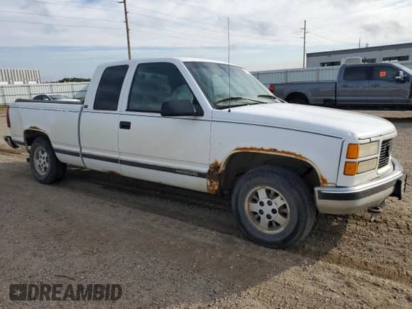 1995 GMC Sierra 1500 z VIN 2GTEC19K8S1573758, wystawiony jako Copart lot #64785104 z przebiegiem 191 121 mil mil oraz Szkoda całkowita • Salvage title. Historia ofert i sprzedaży dostępna na DreamBid. Obrazek 4.