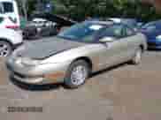 1999 Saturn SC with VIN 1G8ZH1277XZ127585, listed as a IAAI auction lot 43275573 with 96,289 mi miles and . Bid and sale history available at DreamBid. Image 2.