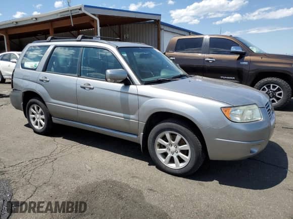 2007 Subaru Forester X with VIN JF1SG65667H703141, listed as a Copart auction lot 60455125 with 274,265 mi miles and Non repairable. Bid and sale history available at DreamBid. Image 4.