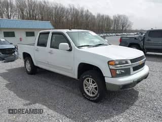 2011 Chevrolet Colorado 1LT z VIN 1GCHTCFE6B8141559, wystawiony jako IAAI lot #41812559 z przebiegiem 147 848 mil mil oraz . Historia ofert i sprzedaży dostępna na DreamBid. Obrazek 1.