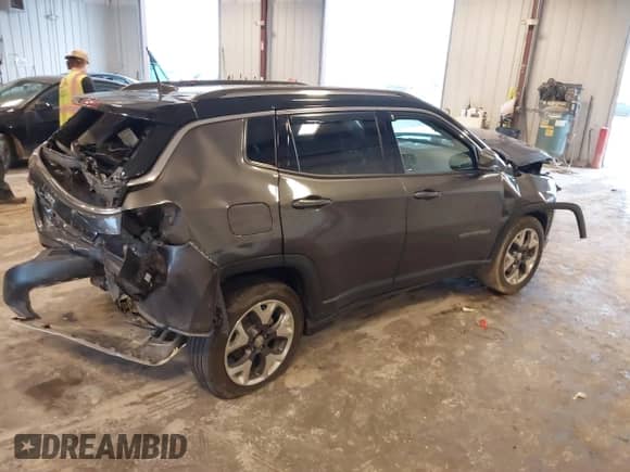 2019 Jeep Compass Limited with VIN 3C4NJDCB1KT780880, listed as a IAAI auction lot 43297174 with 76,843 mi miles and . Bid and sale history available at DreamBid. Image 4.