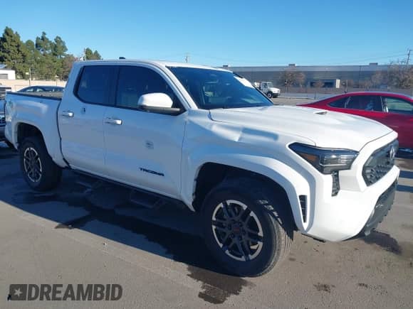 2024 Toyota Tacoma SR5 with VIN 3TMLB5JN8RM034034, listed as a IAAI auction lot 41253779 with 21,448 mi miles and . Bid and sale history available at DreamBid. Image 1.