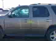2013 Chevrolet Tahoe LT with VIN 1GNSCBE09DR139704, listed as a IAAI auction lot 42720429 with 218,019 mi miles and . Bid and sale history available at DreamBid. Image 14.