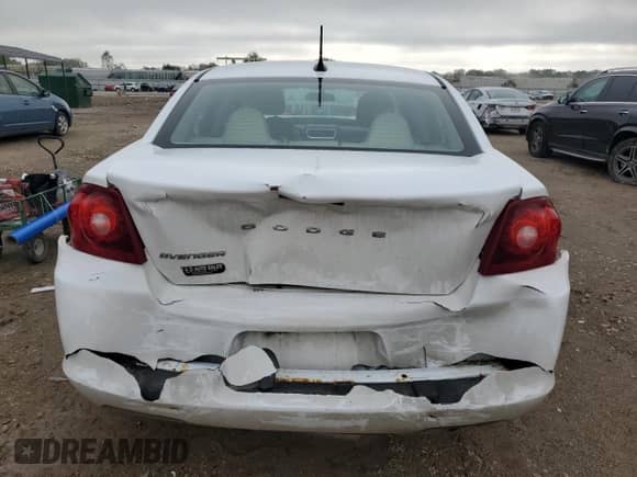 2012 Dodge Avenger SE z VIN 1C3CDZAB6CN147411, wystawiony jako Copart lot #81712965 z przebiegiem 214 093 mil mil oraz Szkoda całkowita • Salvage title. Historia ofert i sprzedaży dostępna na DreamBid. Obrazek 6.