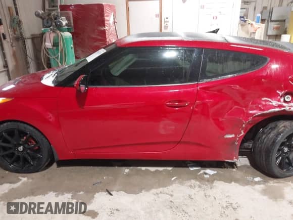 2012 Hyundai Veloster w/Black Int с VIN KMHTC6AD8CU032759, выставлен на аукционе IAAI как лот 41567265 с пробегом 156 973 миль миль и . История ставок и продаж доступна на DreamBid. Изображение 14.