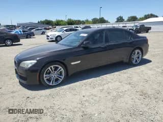 2014 BMW 7 Series 740Li with VIN WBAYE4C58ED137901, listed as a Copart auction lot 61493495 with 206,313 mi miles and Salvage title. Bid and sale history available at DreamBid. Image 1.