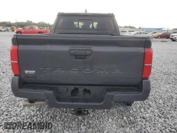 2024 Toyota Tacoma TRD Off Road with VIN 3TMLB5JN7RM019735, listed as a Copart auction lot 81086225 with 13,650 mi miles and Salvage title. Bid and sale history available at DreamBid. Image 6.