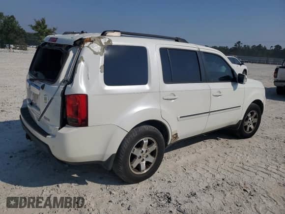 2011 Honda Pilot Touring с VIN 5FNYF3H93BB053642, выставлен на аукционе Copart как лот 71074825 с пробегом 171 403 миль миль и Списание • Salvage title. История ставок и продаж доступна на DreamBid. Изображение 3.