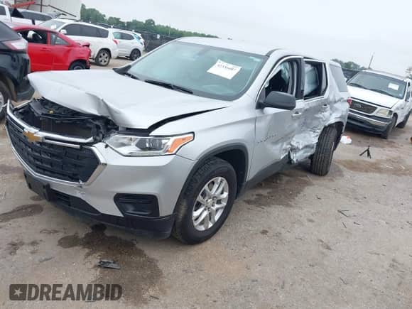 2021 Chevrolet Traverse LS z VIN 1GNERFKW1MJ254095, wystawiony jako IAAI lot #42336687 z przebiegiem Nie podano mil oraz . Historia ofert i sprzedaży dostępna na DreamBid. Obrazek 2.