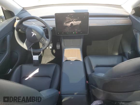 2022 Tesla Model Y Performance with VIN 7SAYGDEF1NF438332, listed as a Copart auction lot 84586025 with 58,800 mi miles and Salvage title. Bid and sale history available at DreamBid. Image 8.
