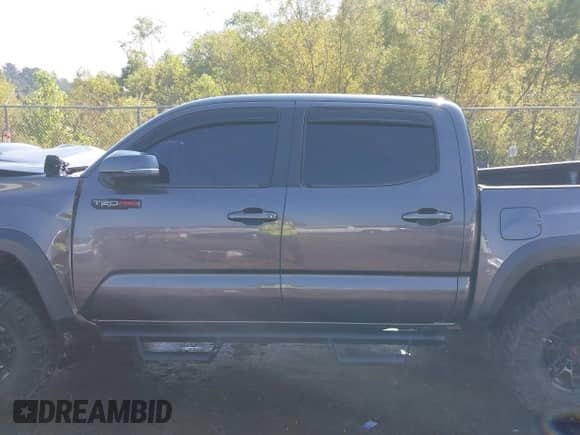 2020 Toyota Tacoma SR5 with VIN 5TFCZ5AN4LX237581, listed as a IAAI auction lot 43191708 with 126,946 mi miles and . Bid and sale history available at DreamBid. Image 14.