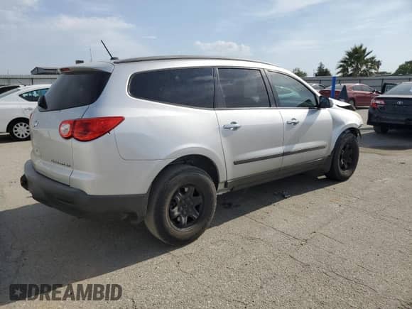 2010 Chevrolet Traverse LS with VIN 1GNLVEEDXAS119954, listed as a Copart auction lot 59377385 with 167,000 mi miles and Salvage title. Bid and sale history available at DreamBid. Image 3.