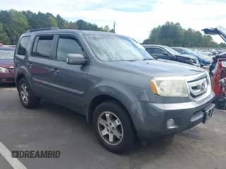 2011 Honda Pilot Touring with VIN 5FNYF3H92BB031308, listed as a IAAI auction lot 43399150 with 133,026 mi miles and . Bid and sale history available at DreamBid. Image 1.