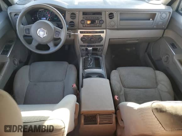 2006 Jeep Commander с VIN 1J8HG48KX6C314122, выставлен на аукционе Copart как лот 77355314 с пробегом 184 892 миль миль и Списание • Salvage title. История ставок и продаж доступна на DreamBid. Изображение 8.