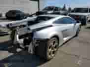 2004 Lamborghini Gallardo с VIN ZHWGU11M94LA01754, выставлен на аукционе Copart как лот 67935984 с пробегом 17 188 миль миль и Списание • Salvage title. История ставок и продаж доступна на DreamBid. Изображение 3.