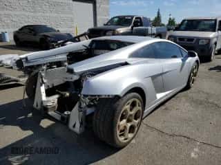 2004 Lamborghini Gallardo с VIN ZHWGU11M94LA01754, выставлен на аукционе Copart как лот 67935984 с пробегом 17 188 миль миль и Списание • Salvage title. История ставок и продаж доступна на DreamBid. Изображение 3.