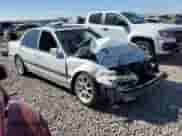 1990 Honda Accord EX z VIN JHMCB7564LC095189, wystawiony jako Copart lot #69300794 z przebiegiem 161 544 mil mil oraz Szkoda całkowita • Salvage title. Historia ofert i sprzedaży dostępna na DreamBid. Obrazek 4.